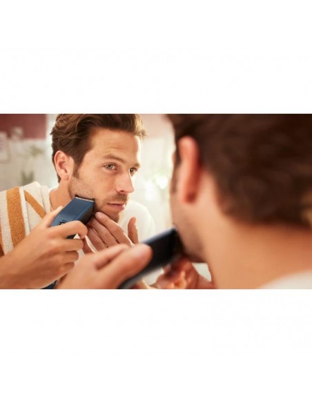 Tondeuse cheveux bleu Philips design ergonomique et prise en main confortable Tondeuse cheveux bleu Philips design ergonomique et prise en main confortable