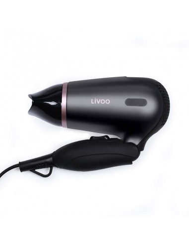 Sèche cheveux compact noir pratique pour tous types de cheveux