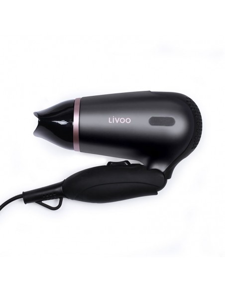 Sèche cheveux compact noir pratique pour tous types de cheveux